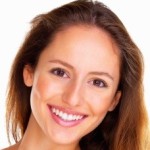 Smiling woman against white background