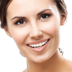 Smiling woman on white background