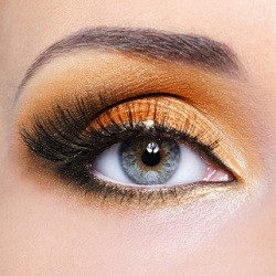 Make-up of woman eye with fashion orange eyeshadow